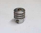 Aluminum heat dissipating anode (plate) cap for transmitting vacuum tubes.