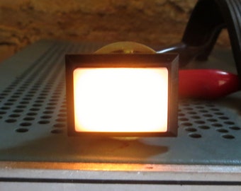 white rectangular illuminated push-button switch