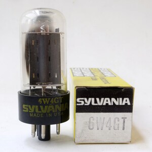 May include: A black and gold 6W4GT vacuum tube with a clear glass envelope. The tube is made by Sylvania and is labeled "Made in USA". The tube is in its original box, which is yellow with black lettering.
