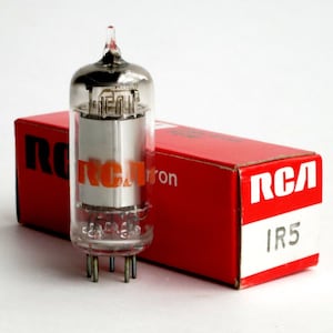 May include: A clear glass vacuum tube with a silver metal base and orange RCA branding. The tube is packaged in a red box with white lettering that reads "RCA IR5".
