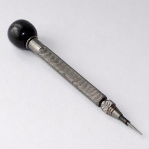 tool for assembling tip-ring-sleeve (patch bay plugs) and tip-sleeve plugs - handles those tiny slotted screws with ease.