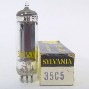 May include: A vintage Sylvania 35C5 vacuum tube in its original box. The tube is clear glass with a black metal base and the box is black with yellow lettering.