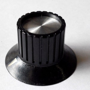Black & Silver skirted radio knob
