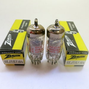 May include: Two silver Zenith 6EJ7/EF184 vacuum tubes in their original yellow boxes. The boxes have black text that reads "Zenith Radionics Tube" and "6EJ7/EF184".