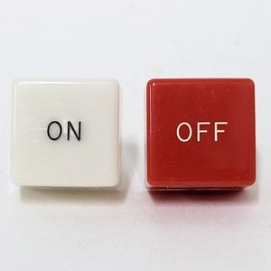 pair of on & off push button caps