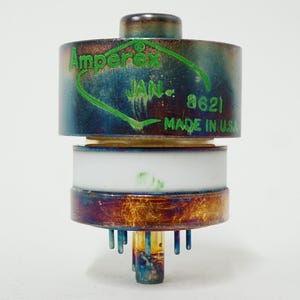 May include: A set of three ceramic mugs with a speckled, matte finish. The mugs are in shades of cream, light gray, and dark gray. Each mug has a simple, minimalist design, perfect for coffee or tea.