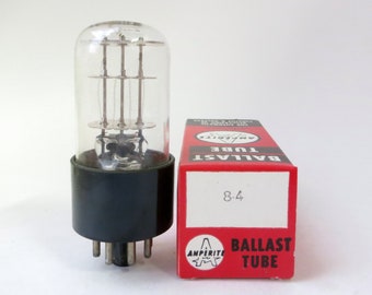 May include: A clear glass tube with a black base and a metal filament inside. The tube is labeled "BALLAST TUBE 8.4 AMPERITE".