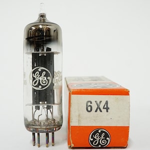May include: A clear glass vacuum tube with internal black metal components and the GE logo printed on the side. Next to it is a rectangular cardboard box with orange and white panels, featuring the text 6X4 and the GE logo on the front.