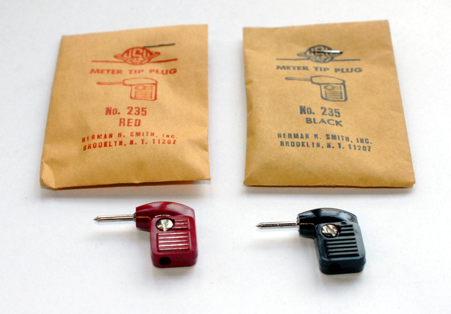 set of 8 H H Smith 200-103 black tip plugs 