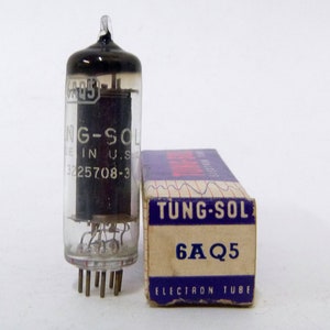 May include: A vintage TUNG-SOL 6AQ5 electron tube with a glass enclosure and metal pins. The tube is next to its original box, which is blue and white and features the TUNG-SOL logo and tube model number.