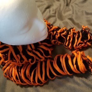 Hand Knit Orange and Black Ruffle Scarf