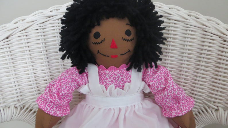 black raggedy ann doll
