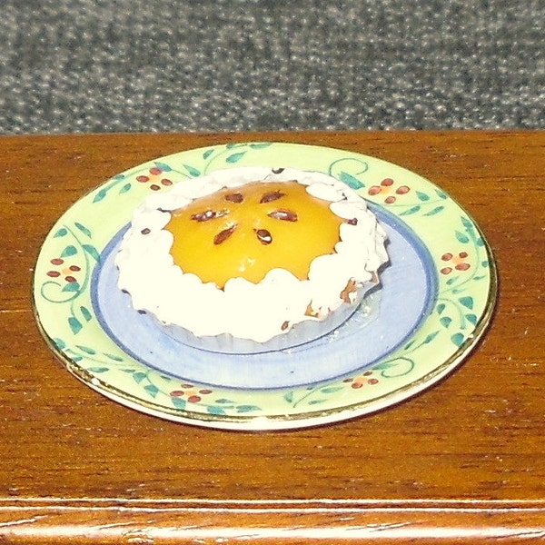 Dollhouse miniature pie on a serving plate