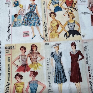 May include: Fabric featuring vintage Simplicity sewing patterns. The designs showcase illustrations of women in dresses and outfits from the mid-20th century. The fabric includes text such as "Simplicity" and pattern numbers.