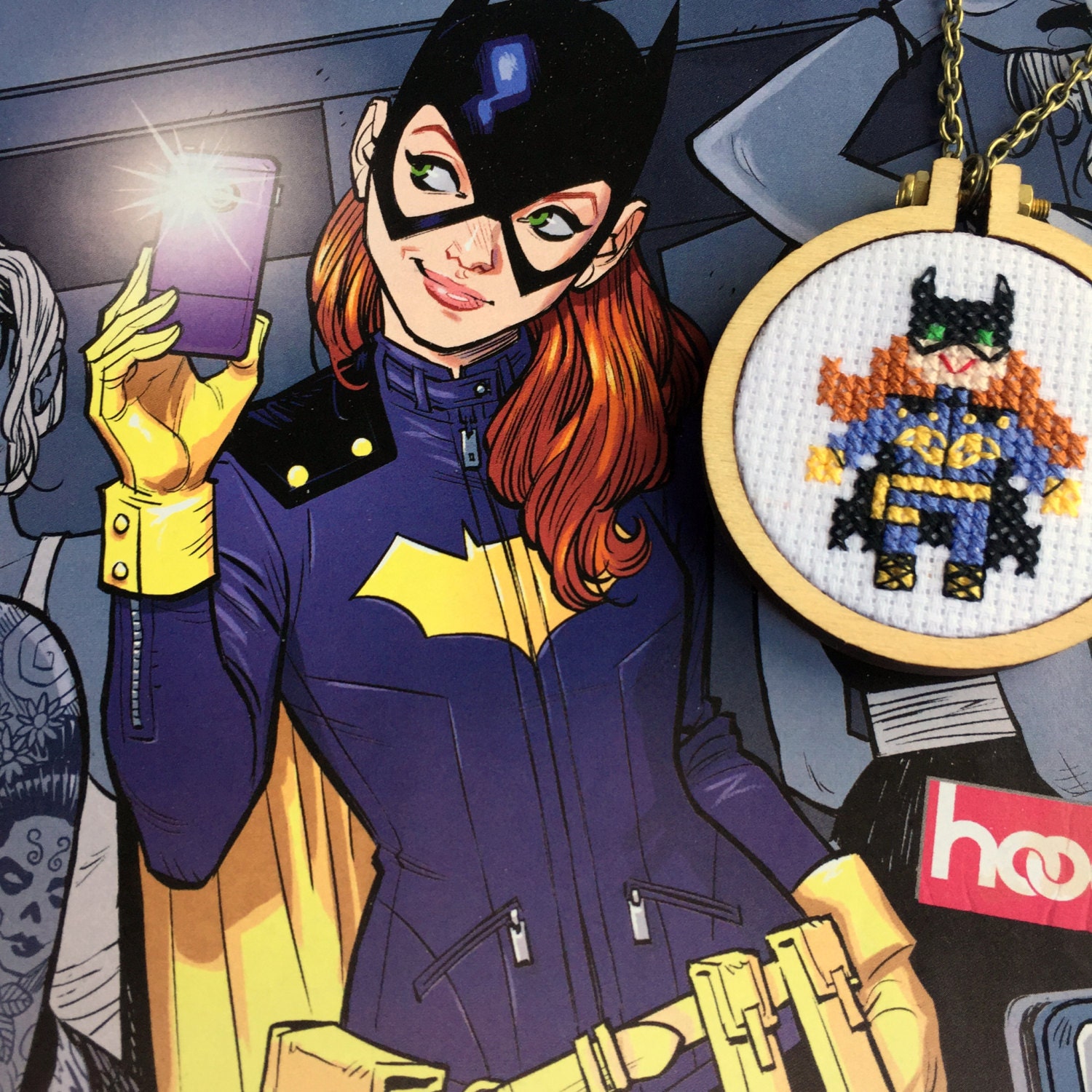 This cross stitch pattern is inspired by the DC female superhero, Batgirl. 