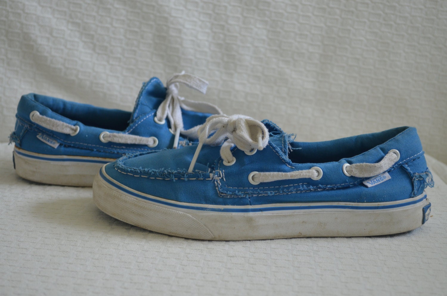 All white top vans boat shoes