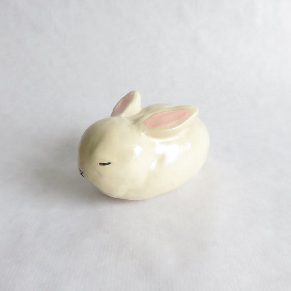 Ceramics and Pottery sculpture, Slepping rabbit, ceramic animal sculpture beige