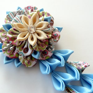 Blue Brown Kanzashi Fabric Flower hair clip with falls. Blue and brown fabric flower.