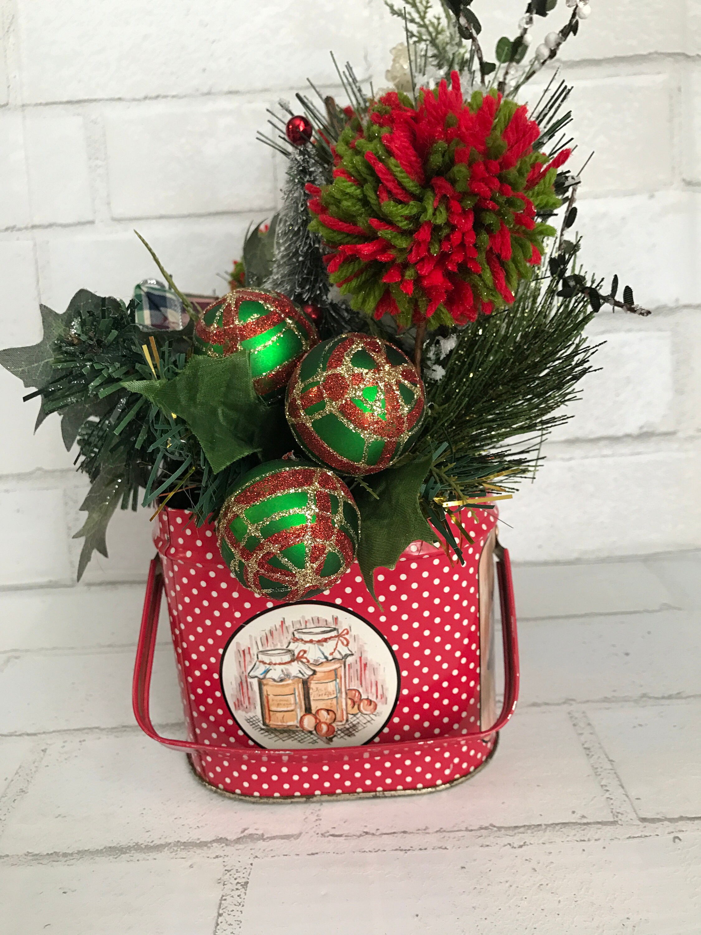 Vintage Tin Christmas Flower Arrangement Greenery Red and Green Pom Poms  and Christmas Balls 