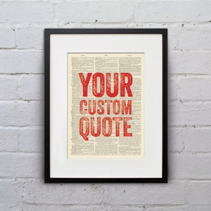 May include: A framed print with a vintage dictionary page background. The text "YOUR CUSTOM QUOTE" is printed in red on the page.