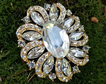 large gold brooch