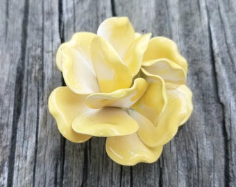yellow brooch