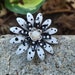 see more listings in the Metal Flower Brooches section