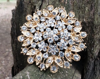 large gold brooch