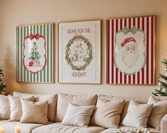 May include: A cozy living room decorated for Christmas. Features a beige sectional sofa, a wooden coffee table with candles, and three framed holiday art prints. Two Christmas trees flank the sofa, adorned with ornaments.