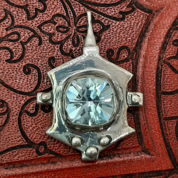 The QuestMaster- Aquamarine and Silver Pendant - Hand Faceted and Hand Carved - Part of the Castle Series