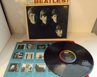 Meet The Beatles The First Album By Englands Phenomenal Pop Combo Capital Records  T-2047