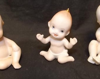 Three Lefton Kewpie Porcelain Figures - See Description for details