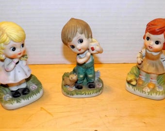 Set of Three Bisque Porcelain Girl and boy Figures Made in Japan