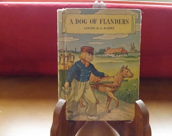 Een hond van Vlaanderen door Louise de la Ramee - Zie beschrijving voor details