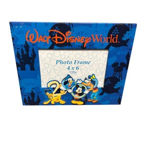 May include: A rectangular Walt Disney World photo frame with a blue background featuring silhouettes of castles and Mickey Mouse icons. The frame displays the text Walt Disney World, Photo Frame, and 4 x 6, with Pluto, Donald Duck, Mickey Mouse, and Goofy.