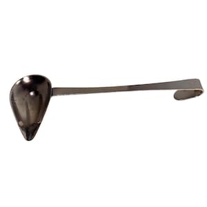 May include: A silver-colored ladle with a teardrop-shaped bowl and a long, flat handle. The handle curves at the end, creating a hook shape. The ladle is designed for pouring liquids and has a small spout at the tip of the bowl.