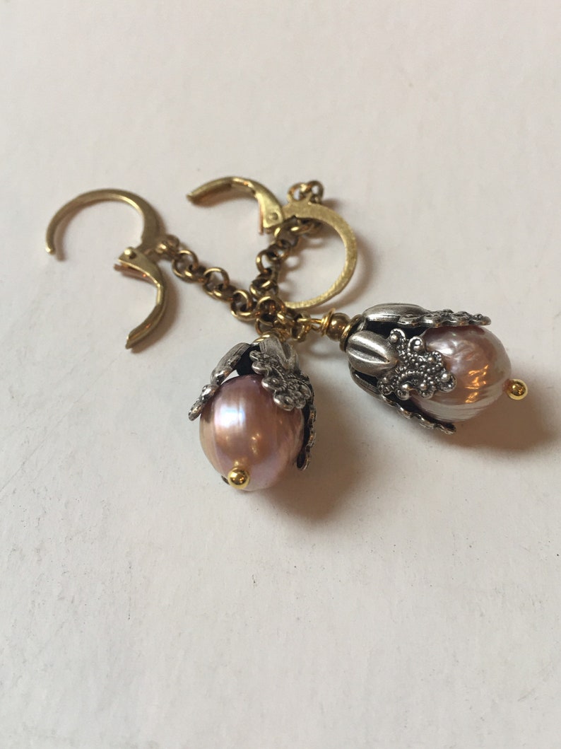 Vintage inspired long pearl earrings with silver floral cap and brass chain
