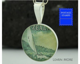 Maritime Charm Gift for Her. Sterling Silver Sailboat Pendant features a Vintage New Zealand Postage Stamp. Perfect Kiwi Present for Her.