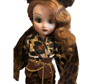 Madame Alexander “Couture Collection Coral and Leopard Travel Ensemble" Doll COA