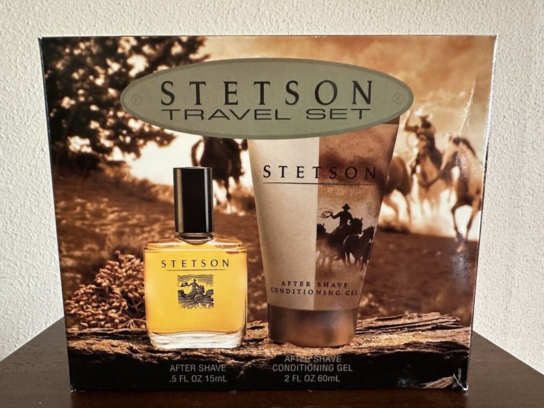 May include: A travel set of Stetson men's grooming products. The set includes a 0.5 fl oz (15 ml) bottle of after shave and a 2 fl oz (60 ml) tube of after shave conditioning gel. The packaging features a western-themed design with a cowboy riding a horse.