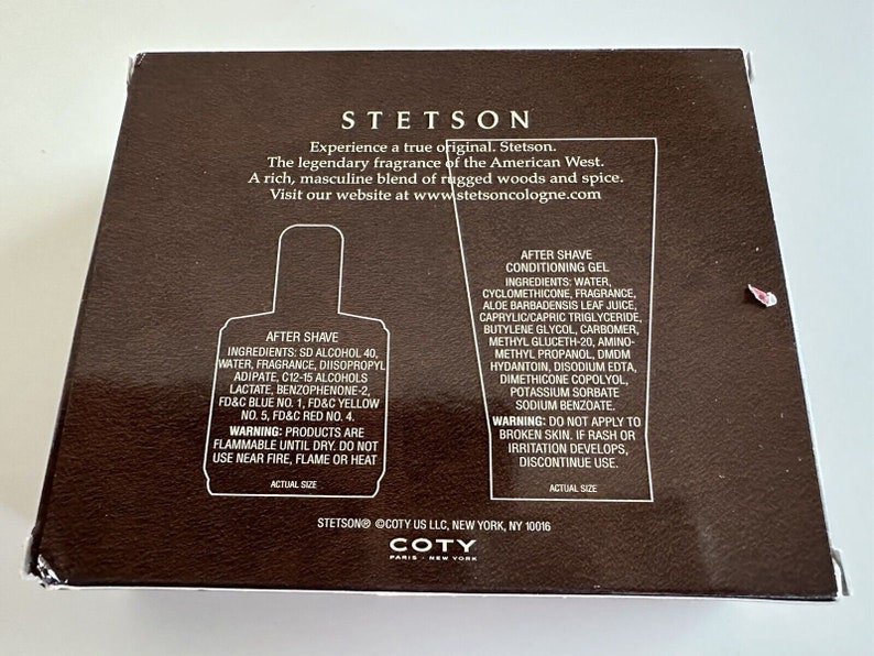 May include: A brown box with a Stetson cologne aftershave bottle and aftershave conditioning gel. The box has the Stetson logo and the text "Experience a true original. Stetson. The legendary fragrance of the American West. A rich, masculine blend of rugged woods and spice. Visit our website at www.stetsoncologne.com". The box also has the text "COTY Paris New York" on the bottom.