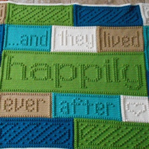 May include: A green, blue, white, and brown crocheted baby blanket with the text "and they lived happily ever after".