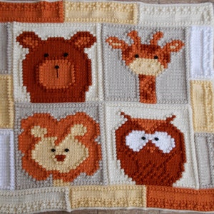 May include: A crocheted baby blanket with a brown bear, giraffe, lion, and owl design. The blanket is made with beige, brown, orange, and yellow yarn.