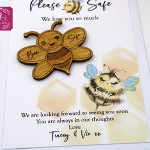 Bee Safe Wir denken an Sie Karte und eine Bee Safe Token