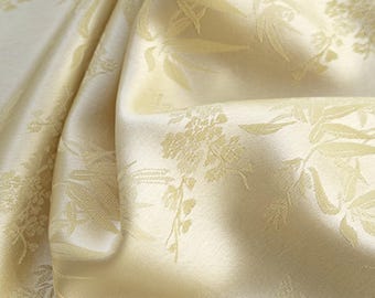 Light yellow color triacetate fabric with bamboo-leaf jacquard fabric, silk-like texture and satin