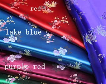 May include: Five different colors of fabric with a floral pattern. The colors are red, lake blue, purple red, green, and blue.
