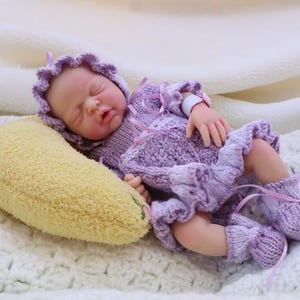 May include: A set of three ceramic mugs with a speckled, matte finish in cream, light grey, and dark grey. Each mug has a simple, minimalist design, ideal for coffee or tea.