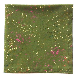 May include: A square, olive green pocket square with a speckled pattern of pink and yellow dots. The edges are finished with a scalloped stitch. This accessory adds a pop of color and style.