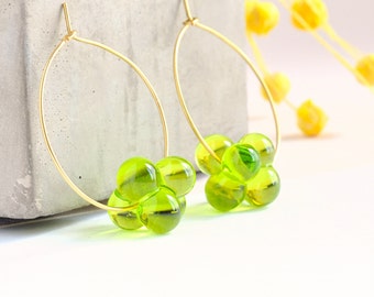 Murano green glass earrings, big and lightfull golden stainless steel hoops