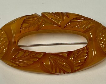 Vintage Butterscotch CARVED Oval Bakelite Brooch Pin